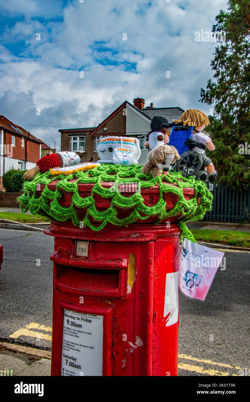 A crocheted 'Post box topper' near Marlborough park special school,. Sidcup Stock Photo Alamy