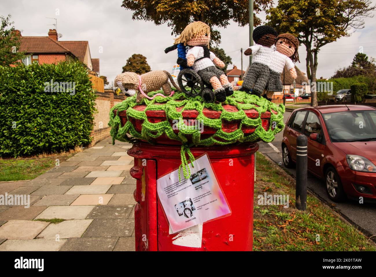 A crocheted 'Post box topper' near Marlborough park special school,. Sidcup Stock Photo Alamy