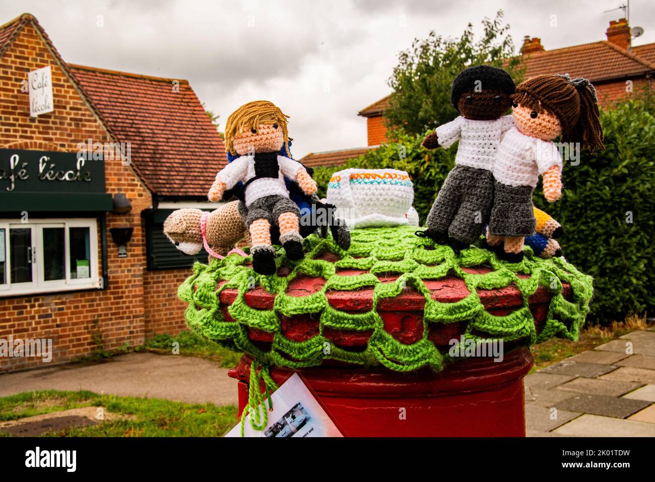 A crocheted 'Post box topper' near Marlborough park special school,. Sidcup Stock Photo Alamy