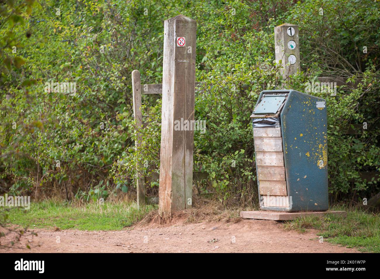 Isolated litter bin (rubbish/waste bin) in a UK country park. Stock Photo