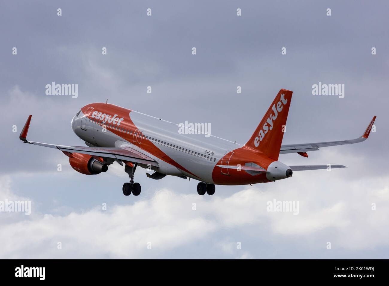 An Easyjet Airbus A320-200 Airliner, serial number G-EZOK, taking off from Bristol Lulsgate Airport in England. Stock Photo