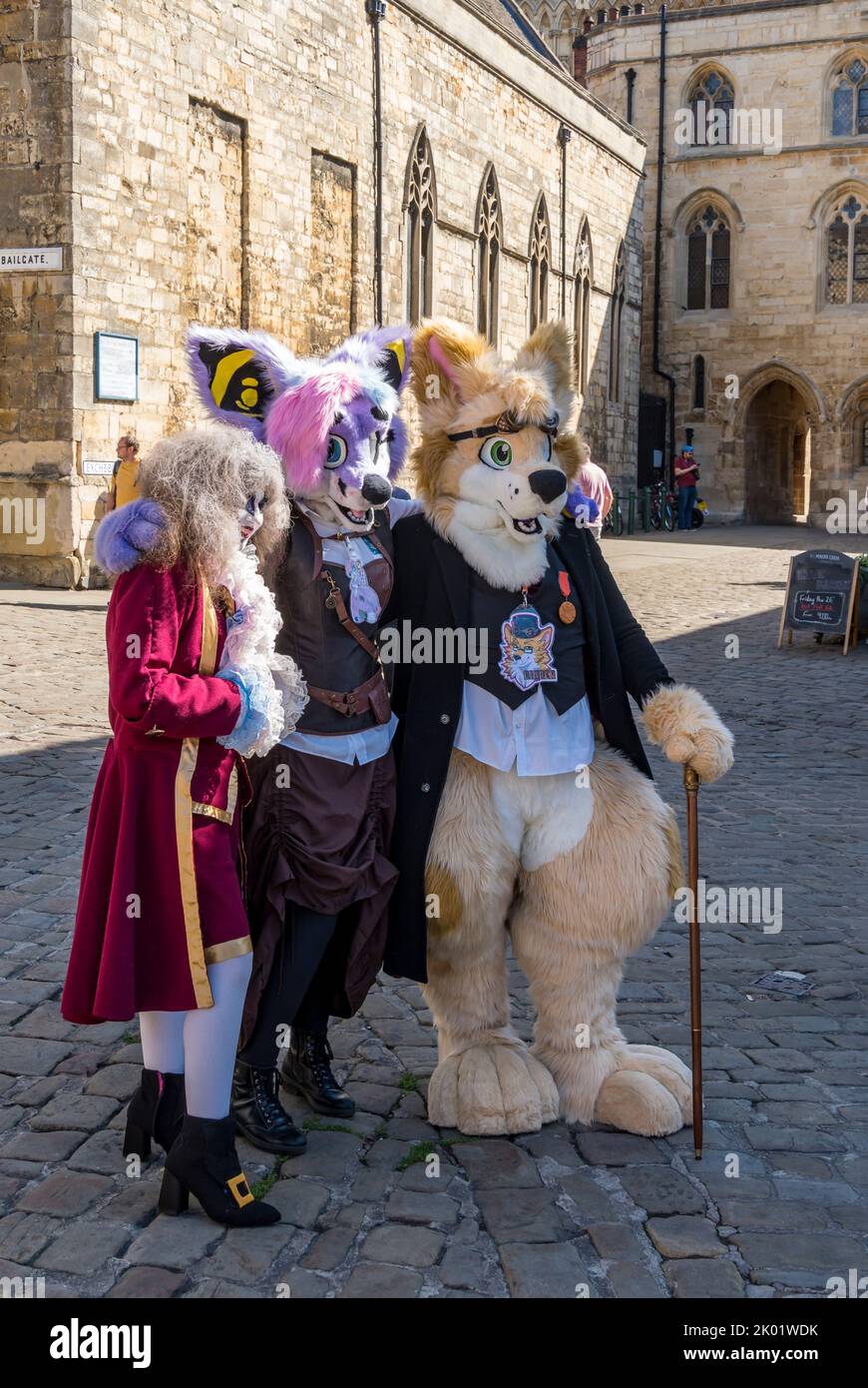 Three people in Steampunk costume, Lincoln Steampunk Festival, Castle Hill Lincoln 2022 Stock Photo