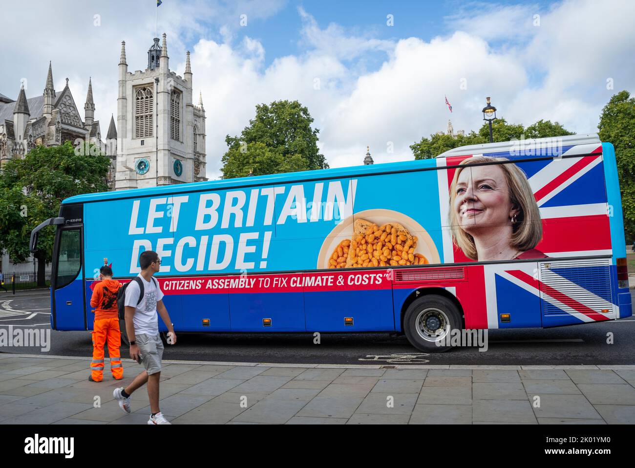 A hoax bus from Extinction Rebellion with the appearance of a Liz Truss campaign bus. Citizen's assembly and Let Britain Decide slogans. At Parliament Stock Photo