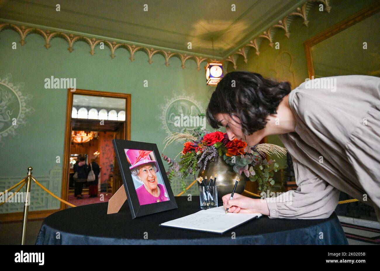 Brighton UK 9th September 2022 - A book of Condolence for the Queen is signed at The Royal Pavilion in Brighton today after her death at the age of 96 was announced yesterday . Elizabeth II reigned as British monarch for 70 years    : Credit Simon Dack / Alamy Live News Stock Photo