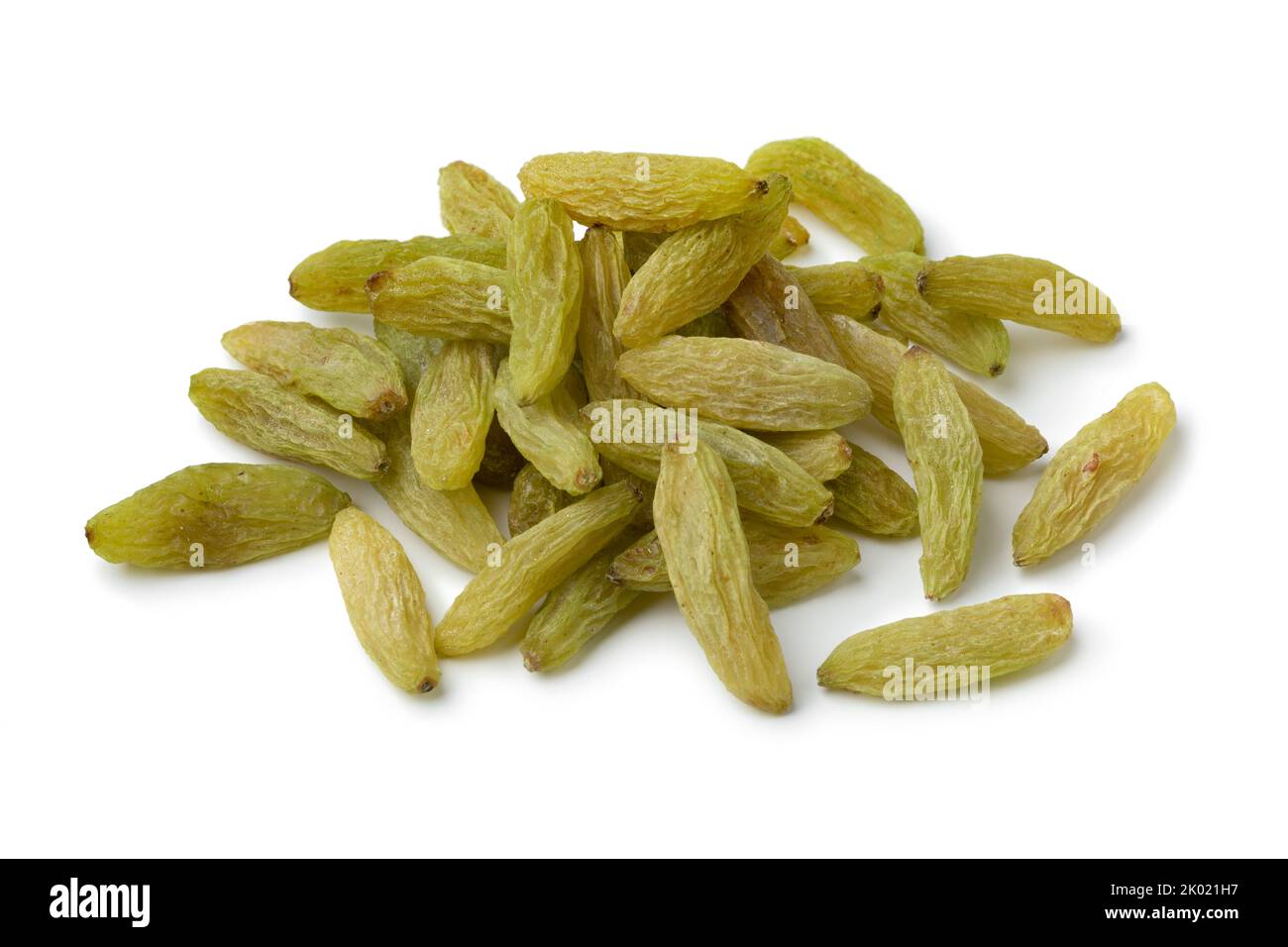 Heap of green Afghans raisins close up isolated on white background Stock Photo