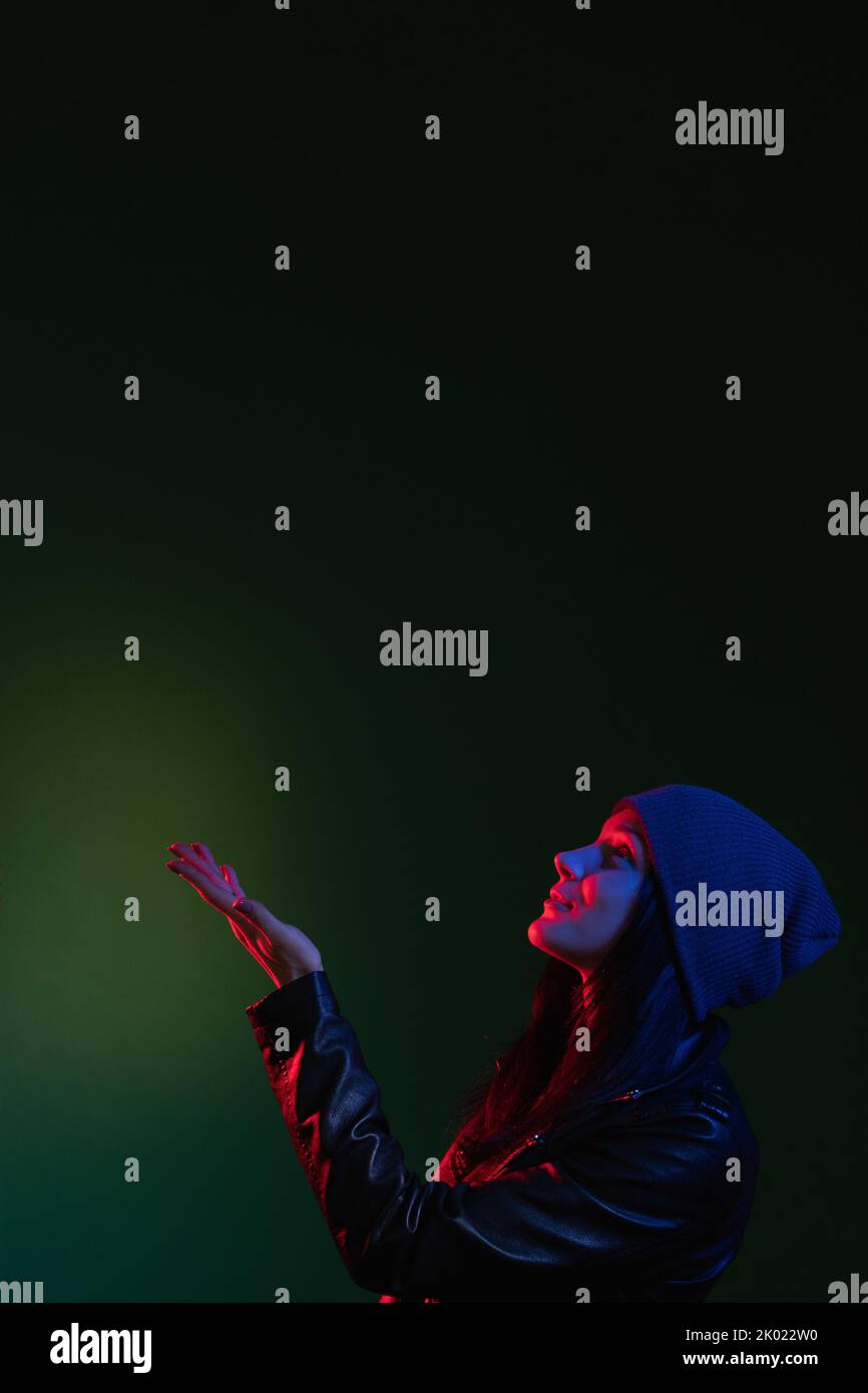 night portrait neon light faith hope woman dark Stock Photo Alamy