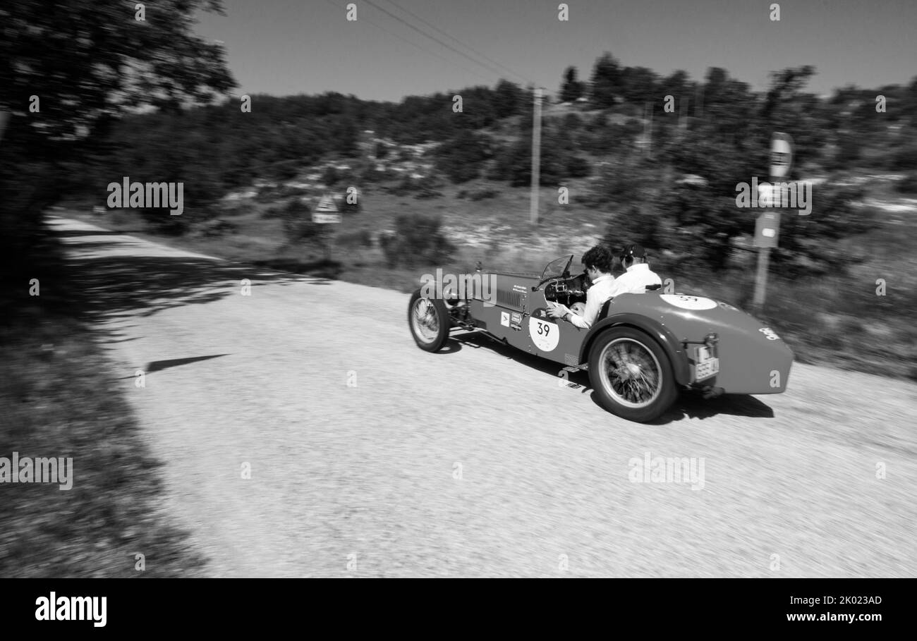 URBINO - ITALY - JUN 16 - 2022 : RALLY ABC 1100 1928 on an old racing car in rally Mille MigLIA Stock Photo