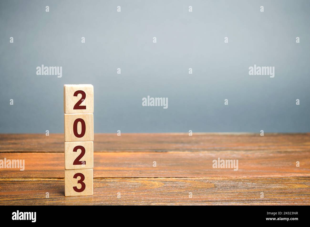 Wooden blocks with the inscription 2023. Setting goals and objectives for the new year. Planning, business management and strategy concept. Trends and Stock Photo