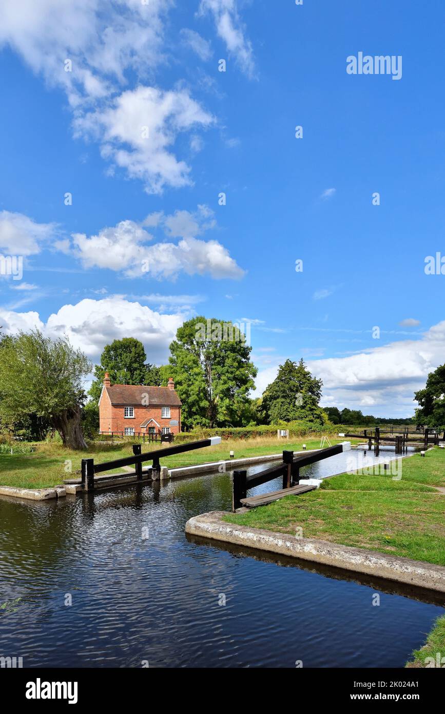 The River Wey Navigation canal at Papercourt lock, Ripley on a sunny