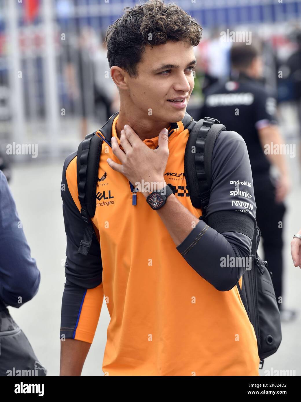 Lando Norris of Great Britain and McLaren looks on in the Paddock prior ...