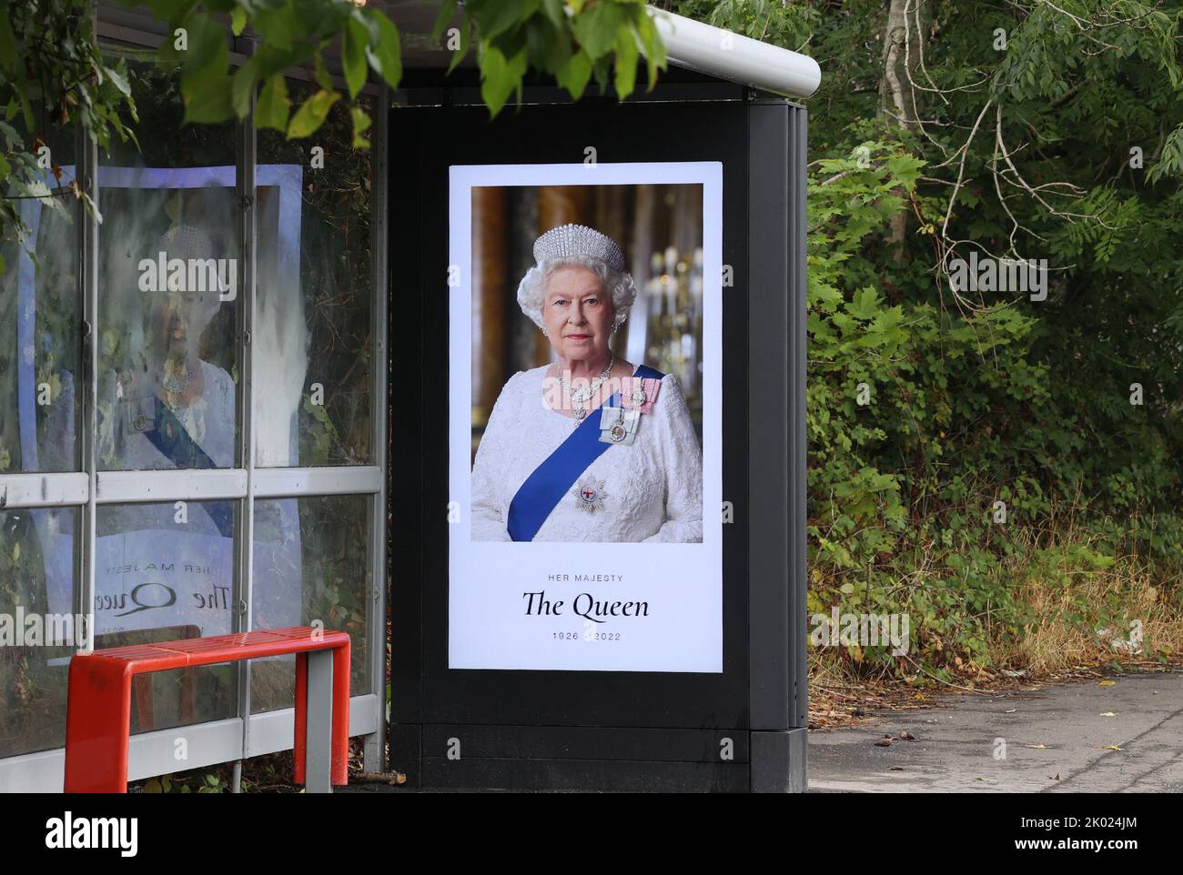 Craigavon, County Armagh, Northern Ireland, UK. 09 Sep 2022. Northern Ireland mourns the death of Her Majesty Queen Elizabeth II. A tribute to Her Majesty on a display at a rural bus stop as the public mourn the loss of our monarch who died yesterday. Credit: CAZIMB/Alamy Live News. Stock Photo