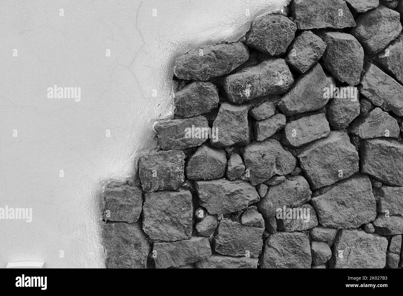 Wall made from Volcanic rock in Santorini , Greece Stock Photo