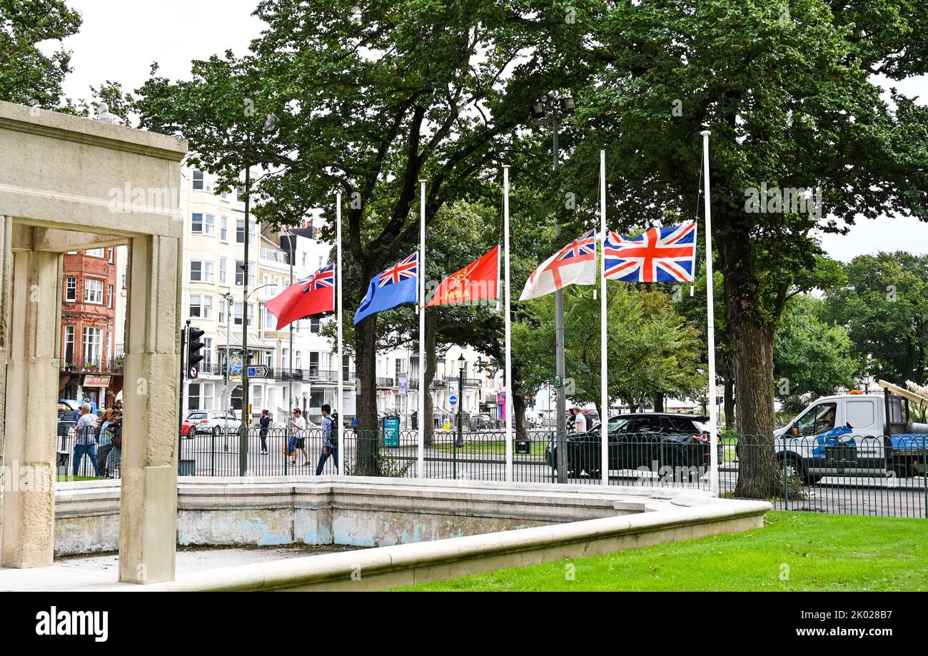 Brighton UK 9th September 2022 - Flags flying at half mast by Brighton War Memorial in respect of the death of Queen Elizabeth II who died yesterday at the age of 96   : Credit Simon Dack / Alamy Live News Stock Photo