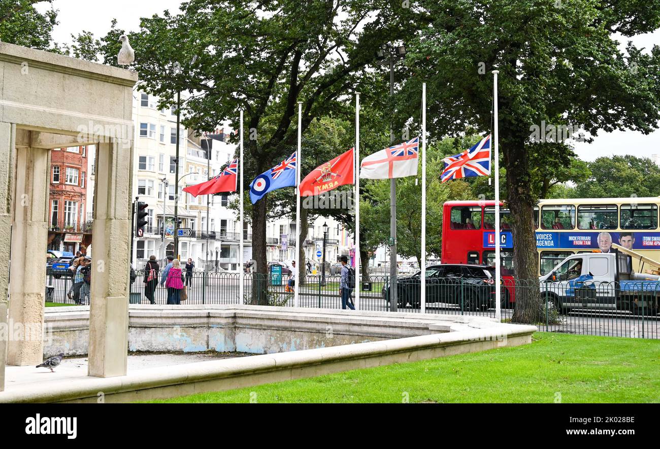 Brighton UK 9th September 2022 - Flags flying at half mast by Brighton War Memorial in respect of the death of Queen Elizabeth II who died yesterday at the age of 96   : Credit Simon Dack / Alamy Live News Stock Photo