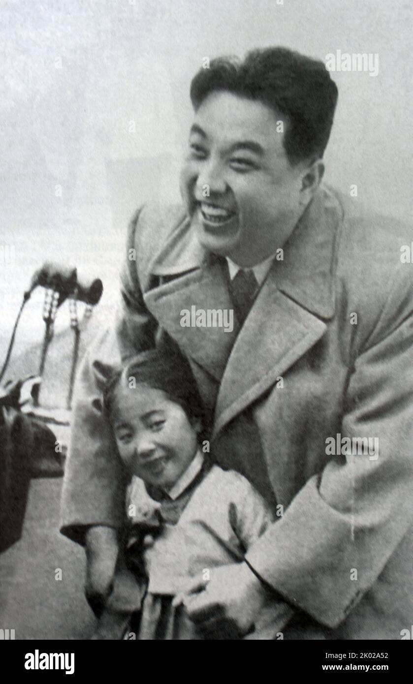 North Korean Leader Kim Il Sung with a child circa 1955 Stock Photo