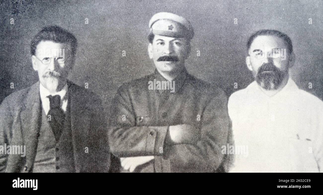 All-Russian Central Executive Committee chairman M.I. Kalinin, a member of the Republics and the South-Western Front Revolutionary Military Council I.V. Stalin. A chairman of the All-Ukrainian Central Executive Committee G.I. Petrovsky. Stock Photo