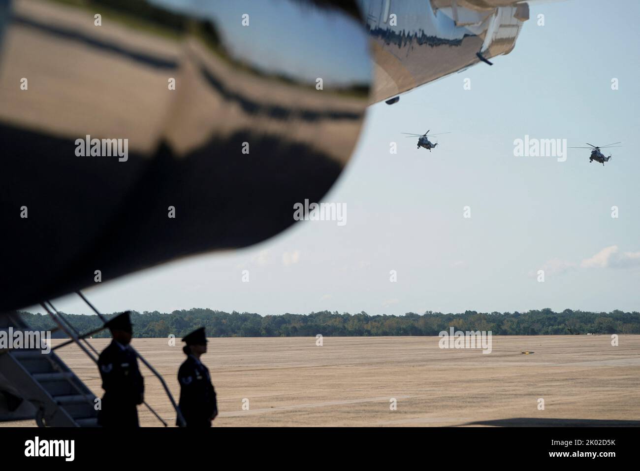Marine One carrying U.S. President Joe Biden passes by Air Force One before his departure for Columbus, Ohio, from Joint Base Andrews in Maryland, U.S., September 9, 2022.      REUTERS/Joshua Roberts Stock Photo