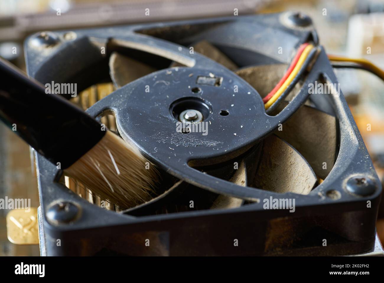 Cleaning dirty desktop computer processor fan from dust by special