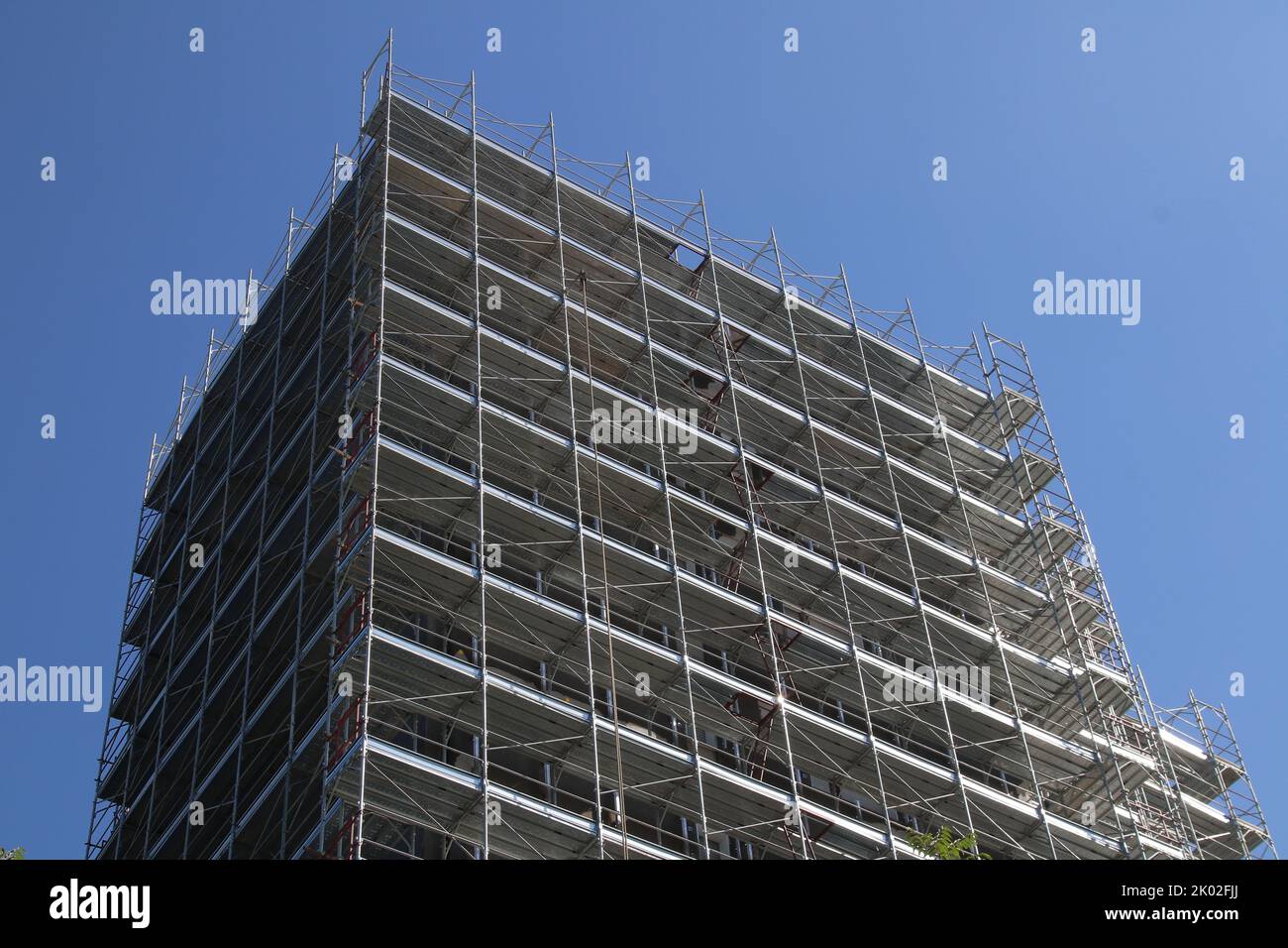 Building scaffolding in Italy for energy saving renovations Stock Photo