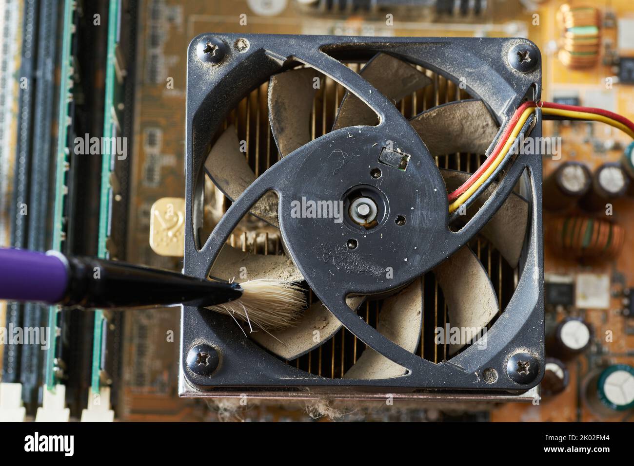 Cleaning dirty desktop computer processor fan from dust by special