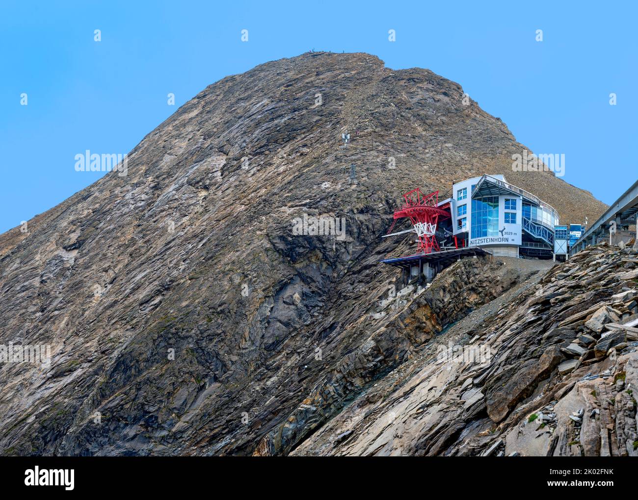 peak of the mountain Kitzsteinhorn in the region Pinzgau of Salzburg with summit station of the cable car, Austria Stock Photo