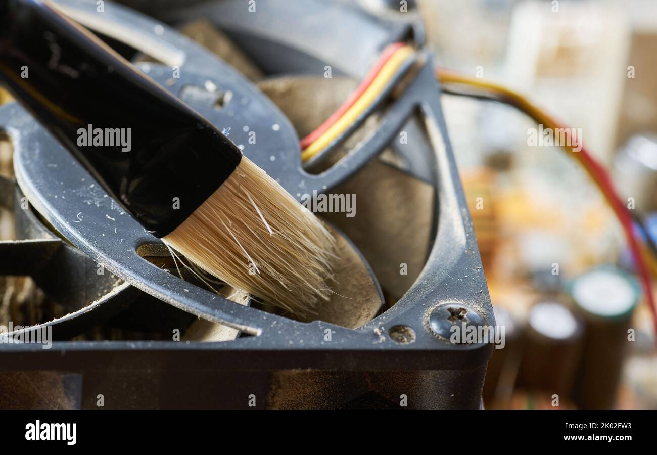 Cleaning dirty desktop computer processor fan from dust by special