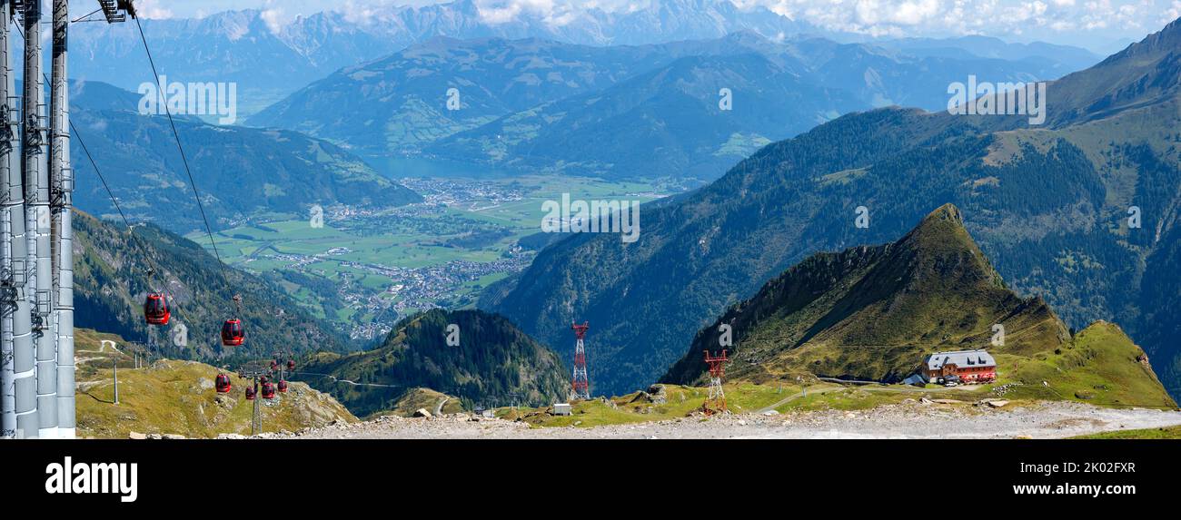 view from the mountain Kitzsteinhorn onto the Zeller basin and the gondola cableway glacier jet in summer, Austria Stock Photo