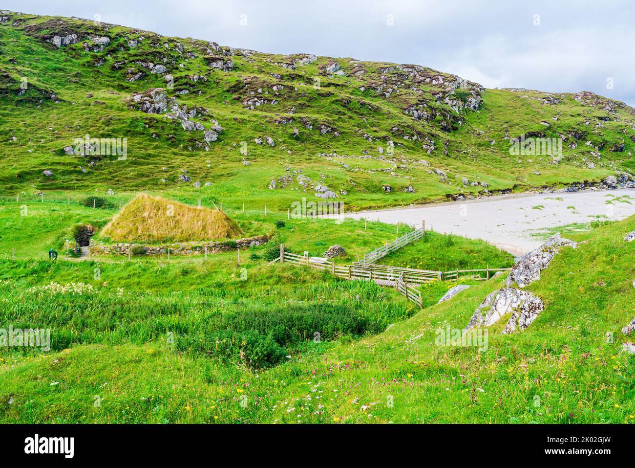 Bosta (Bostadh) Iron Age House covered with grass - Isle Of Lewis, Scotland Stock Photo