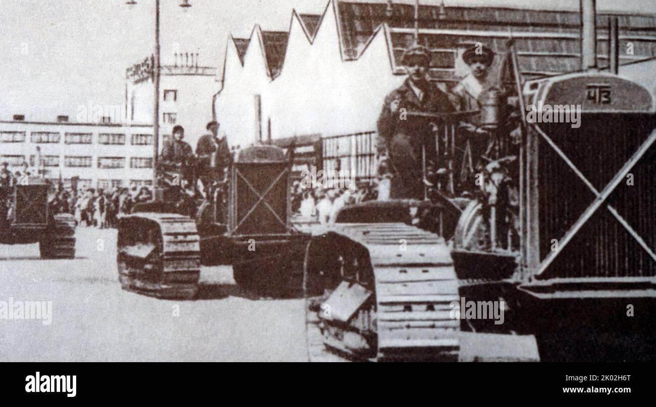 The first column of tractors at the Chelyabinsk Tractor Plant. 1932. Stock Photo