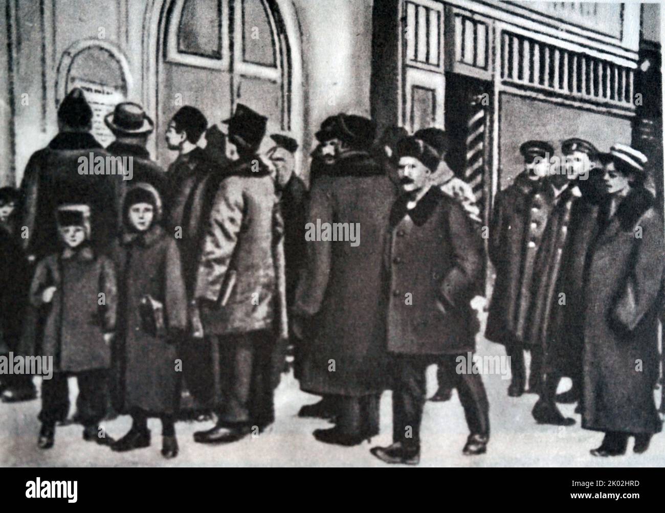 Residents of Petrograd read the first decrees of Soviet power. The Soviet state born of the revolution from the first days of its existence began to fulfil the fundamental demands of the people. The first Leninist decrees of Soviet power satisfied the aspirations of the people for peace and land. Stock Photo