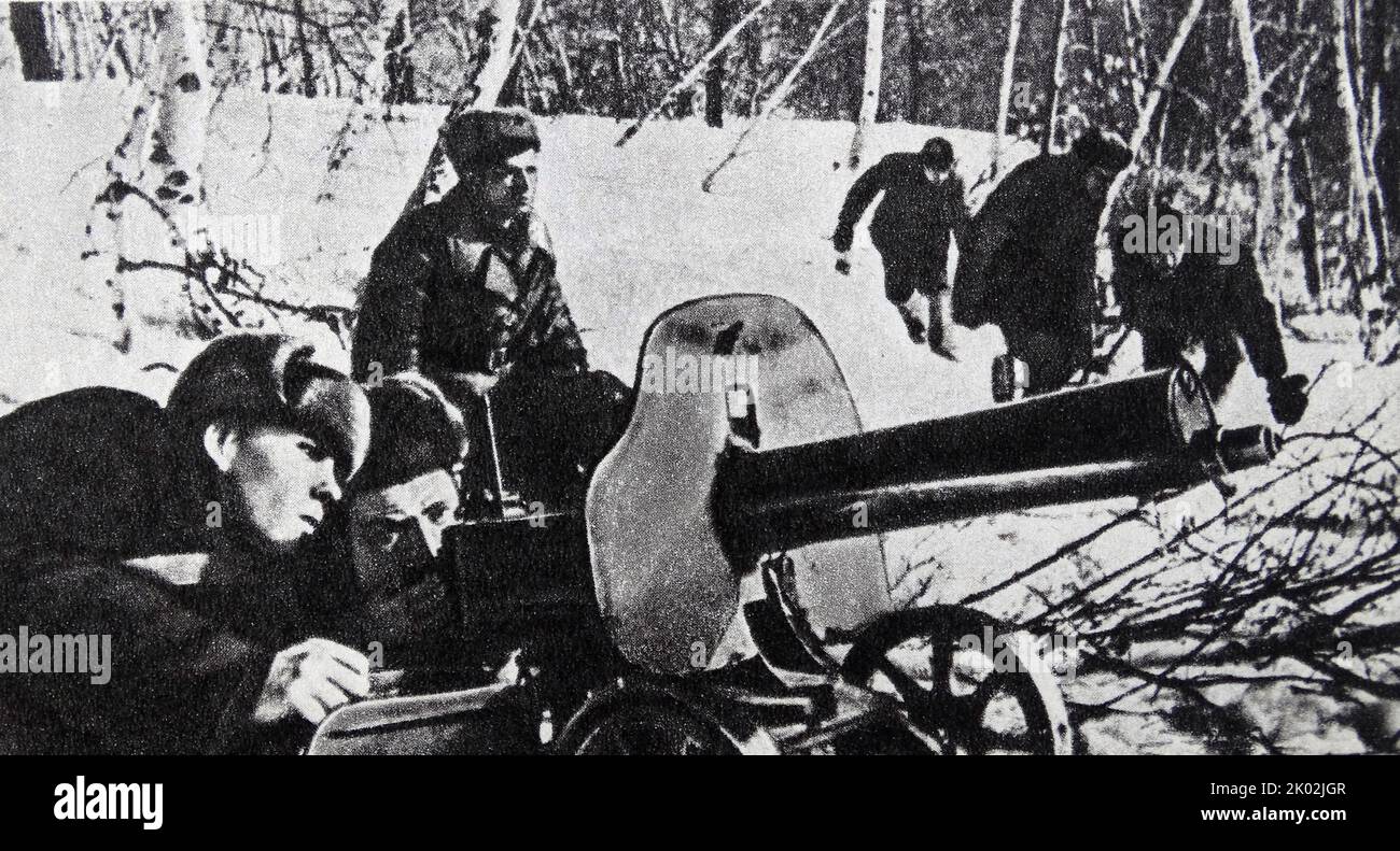Soviet Partisans are fighting along the German retreat paths. 1943 Stock Photo