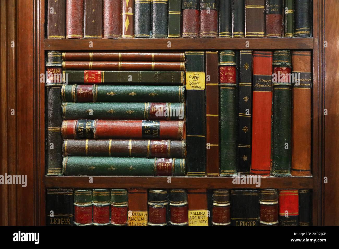 Background of fake old books in a library Stock Photo