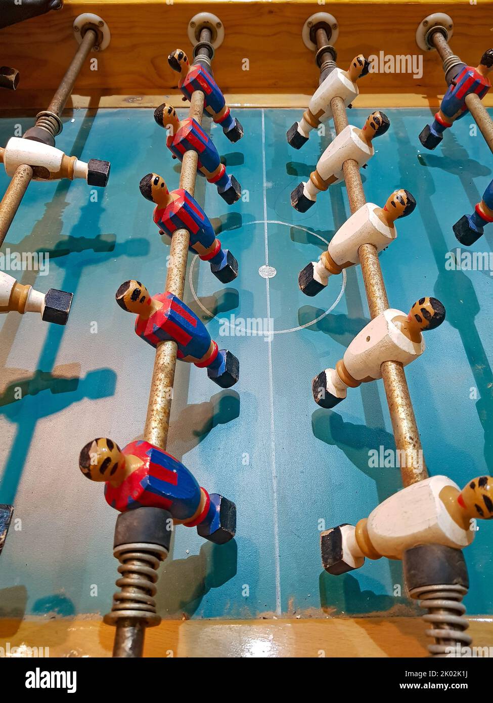 Close up of the players of an old table football Stock Photo - Alamy