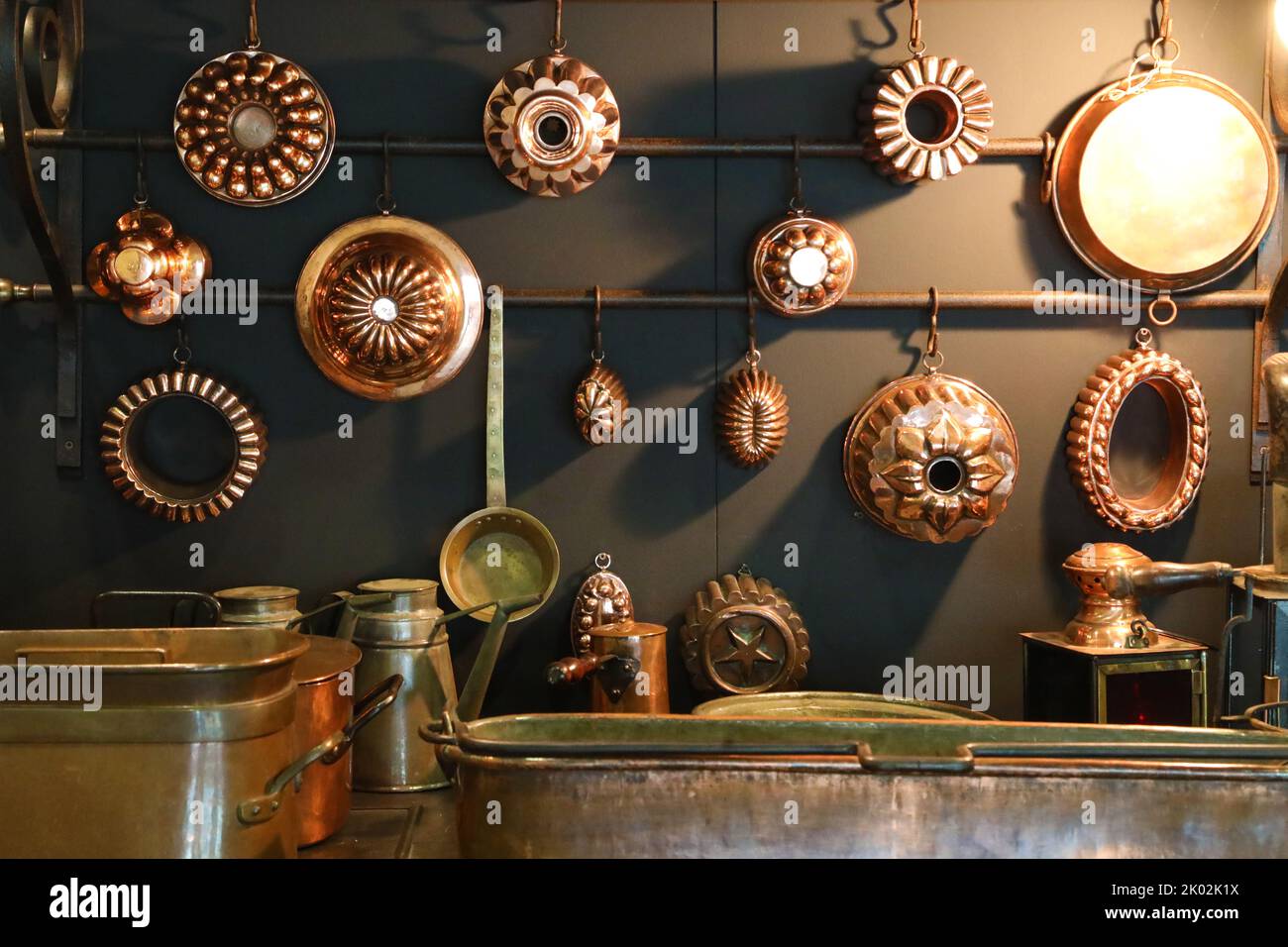 Exposition of vintage copper molds Stock Photo