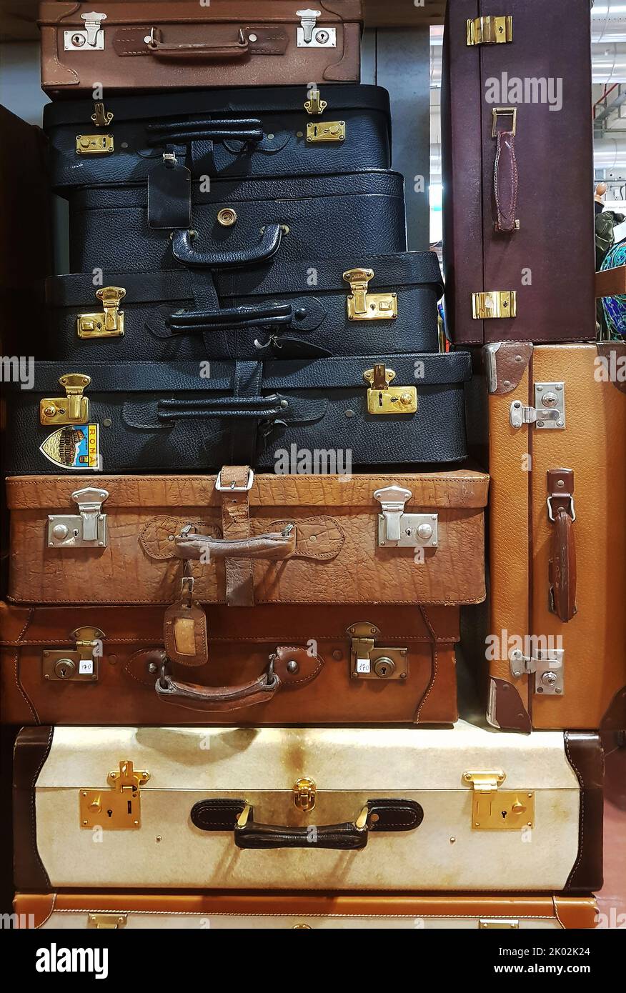 Vertical stack of vintage suitcases Stock Photo