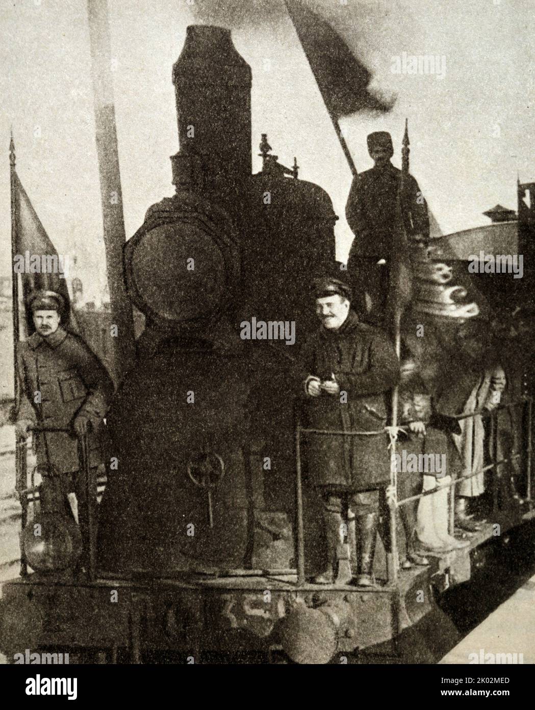 Yefim Alekseevich Pridvorov (1883 - 1945), known by the pen name Demyan Bedny; Soviet Russian poet, Bolshevik and satirist. at the head of a train heading to the front with gifts from workers. Stock Photo