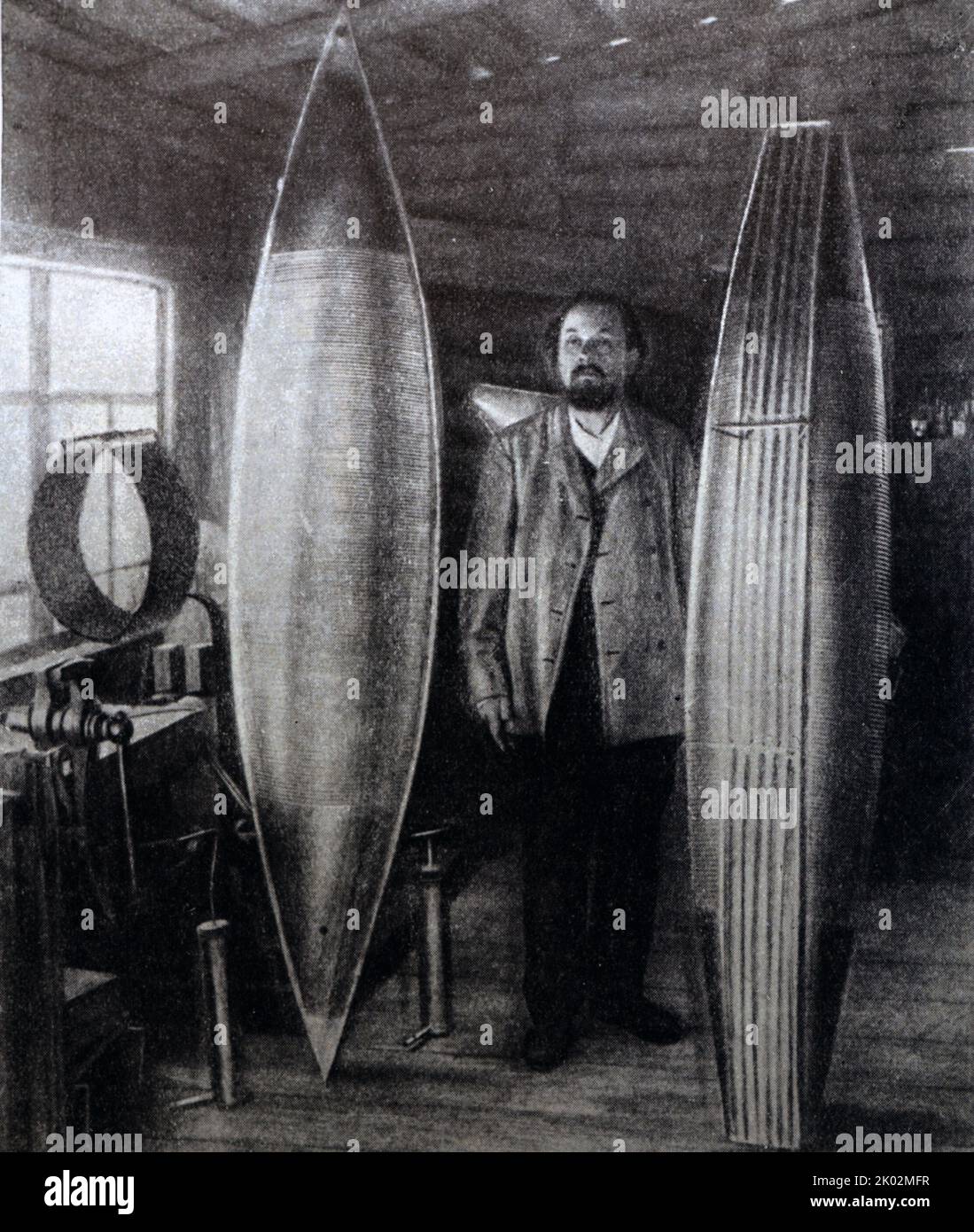 K. E. Tsiolkovsky in his workshop with models of airships. (Photo). Stock Photo