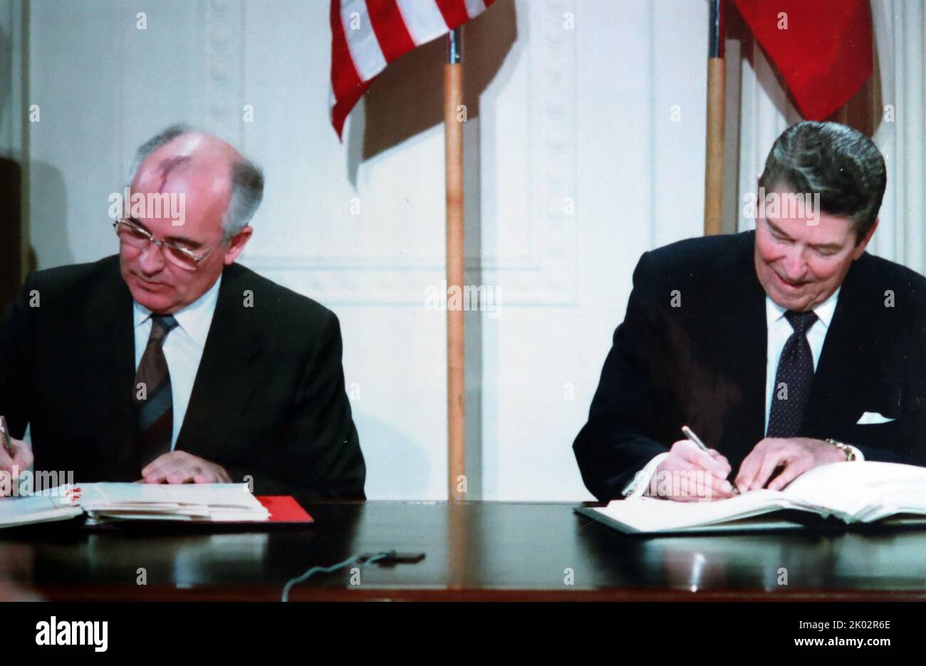 Mikhail Gorbachev and Ronald Reagan sign the INF Treaty. The Intermediate-Range Nuclear Forces Treaty (INF Treaty) Between the United States of America and the Soviet Union, was an arms control treaty, signed on 8 December 1987. Stock Photo