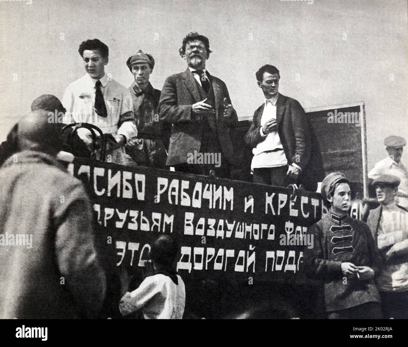 Mikhail Ivanovich Kalinin receives the workers from the first squadron of the Air Fleet of the Land of the Soviets. Moscow, Khodynka. Photo by P. Otsup. Stock Photo
