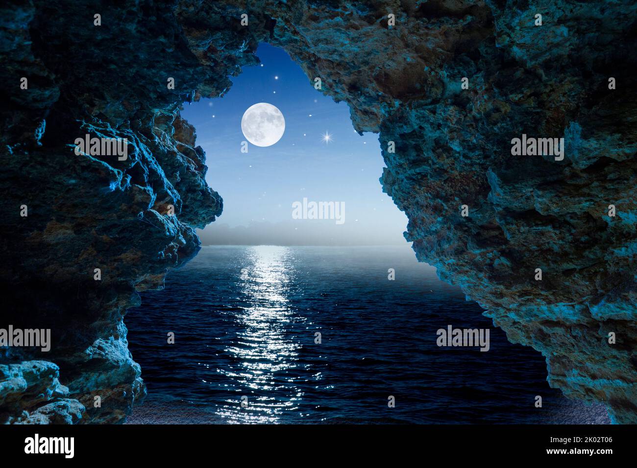 Blue cave with moonlight view Stock Photo