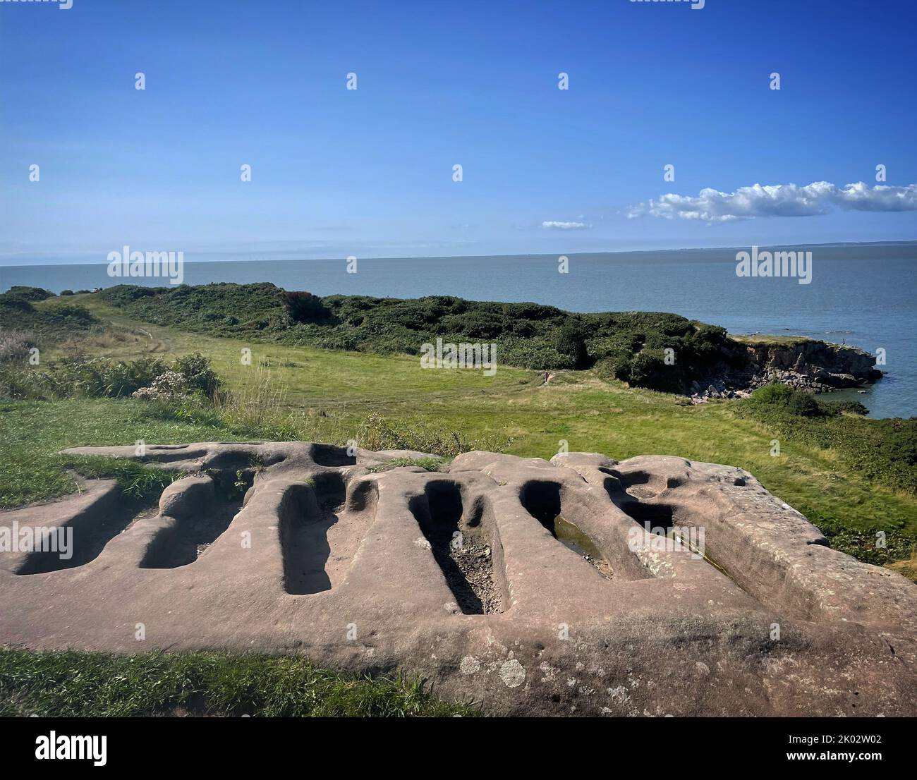A scenery of rockcut graves in Heysham, Morecambe bay, England Stock