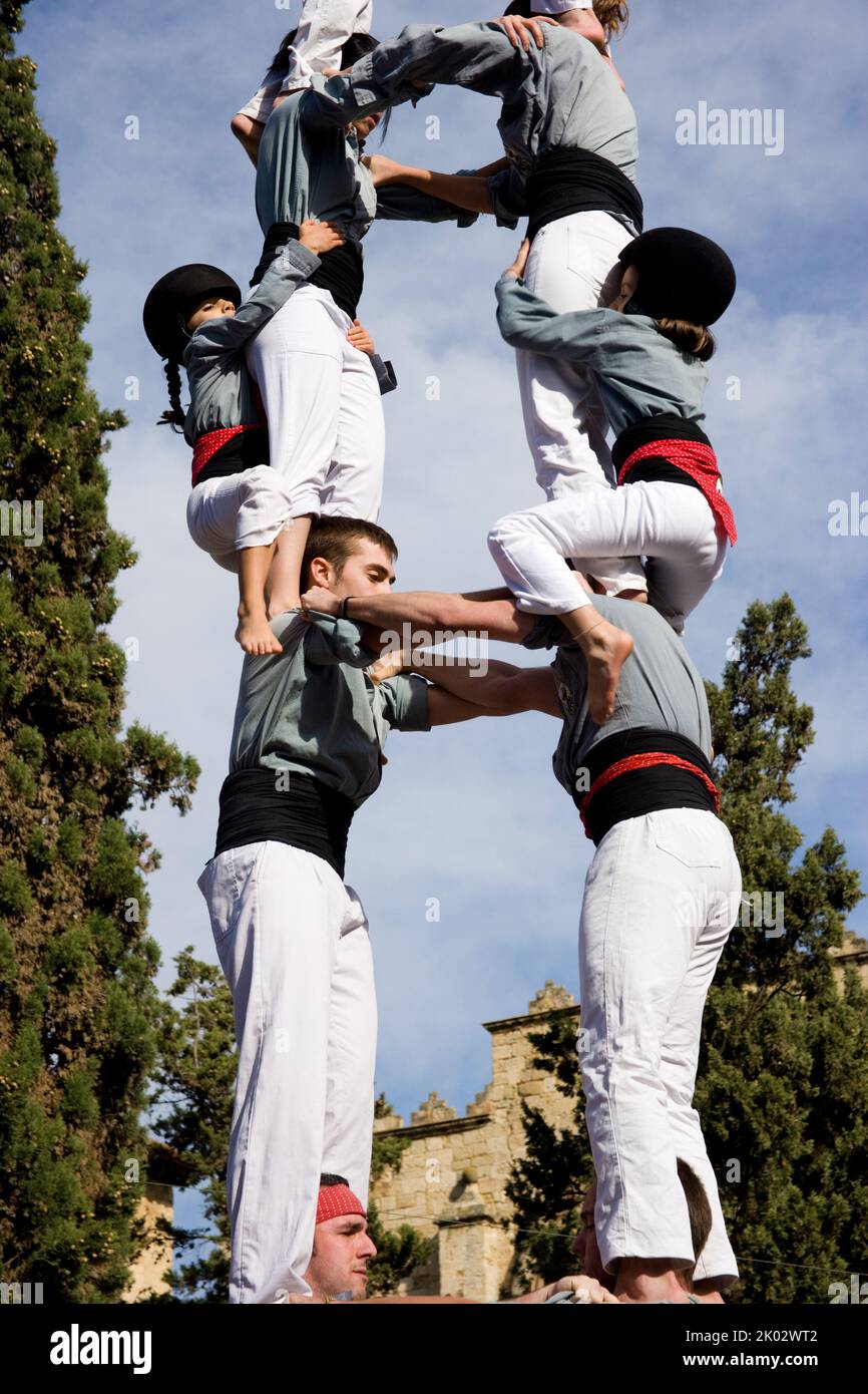 Castellers performing in Plaza Octavia in Sant Cugat del Valles in the province of Barcelona in Catalonia Spain Stock Photo