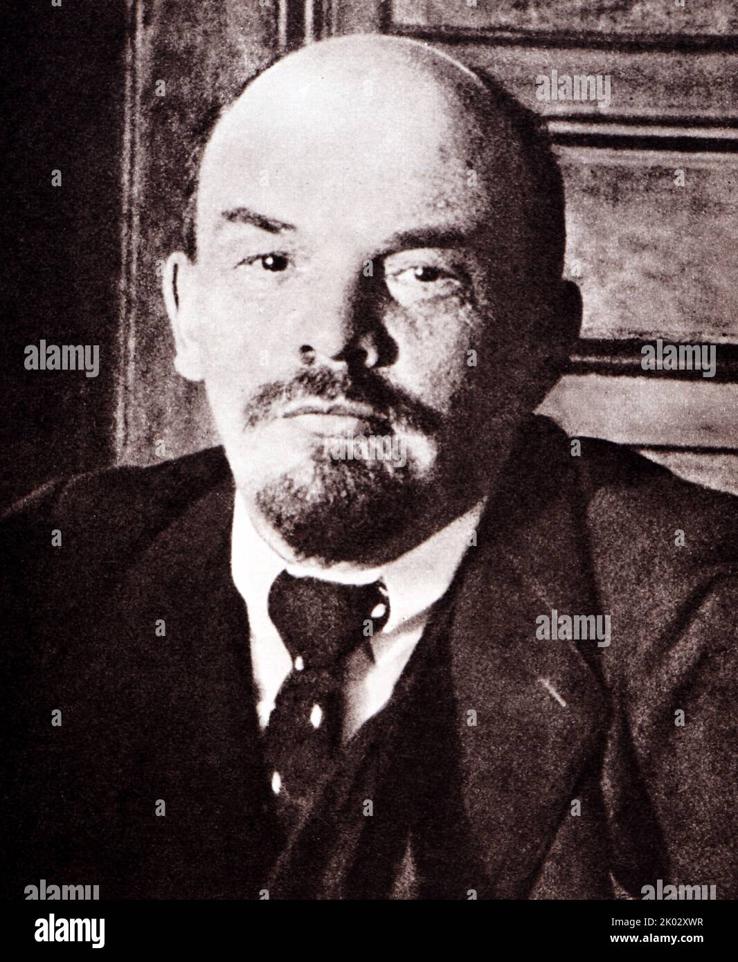 Vladimir Lenin in the Kremlin presides over a meeting of the Council of People's Commissars for recovery from injury. 1918, October 17. Moscow. Photographer - Otsup P. A. Stock Photo