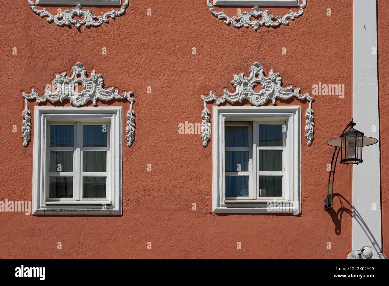 Germany, Bavaria, Upper Bavaria, Traunstein County, Waging am See, market place, red house facade, muntin windows, ornaments, detail Stock Photo