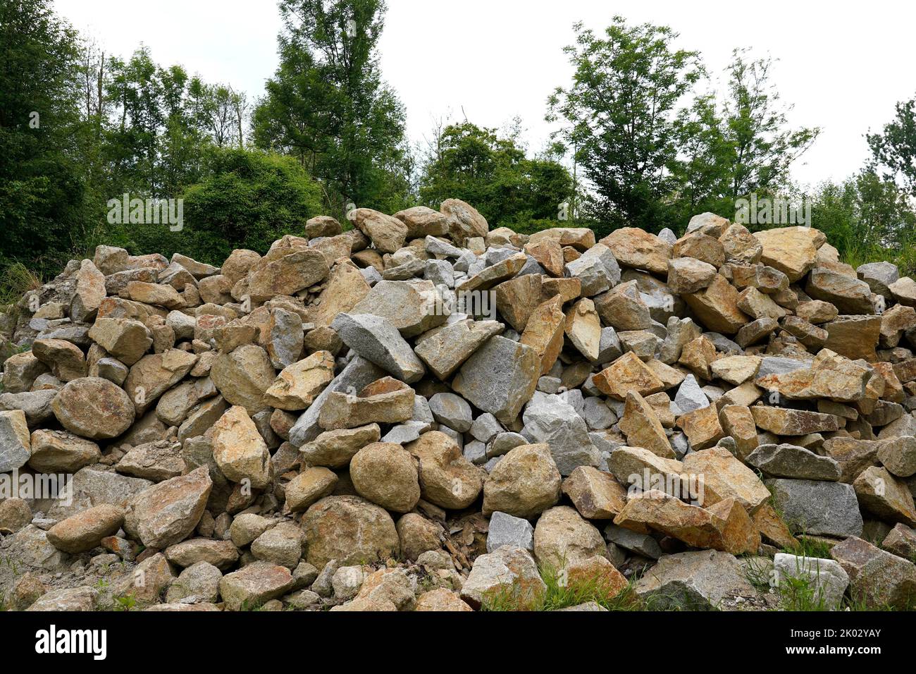 Germany, Bavaria, Upper Bavaria, Altötting district, Neuötting am Inn, stored granite blocks, to secure the embankment of the Inn River Stock Photo
