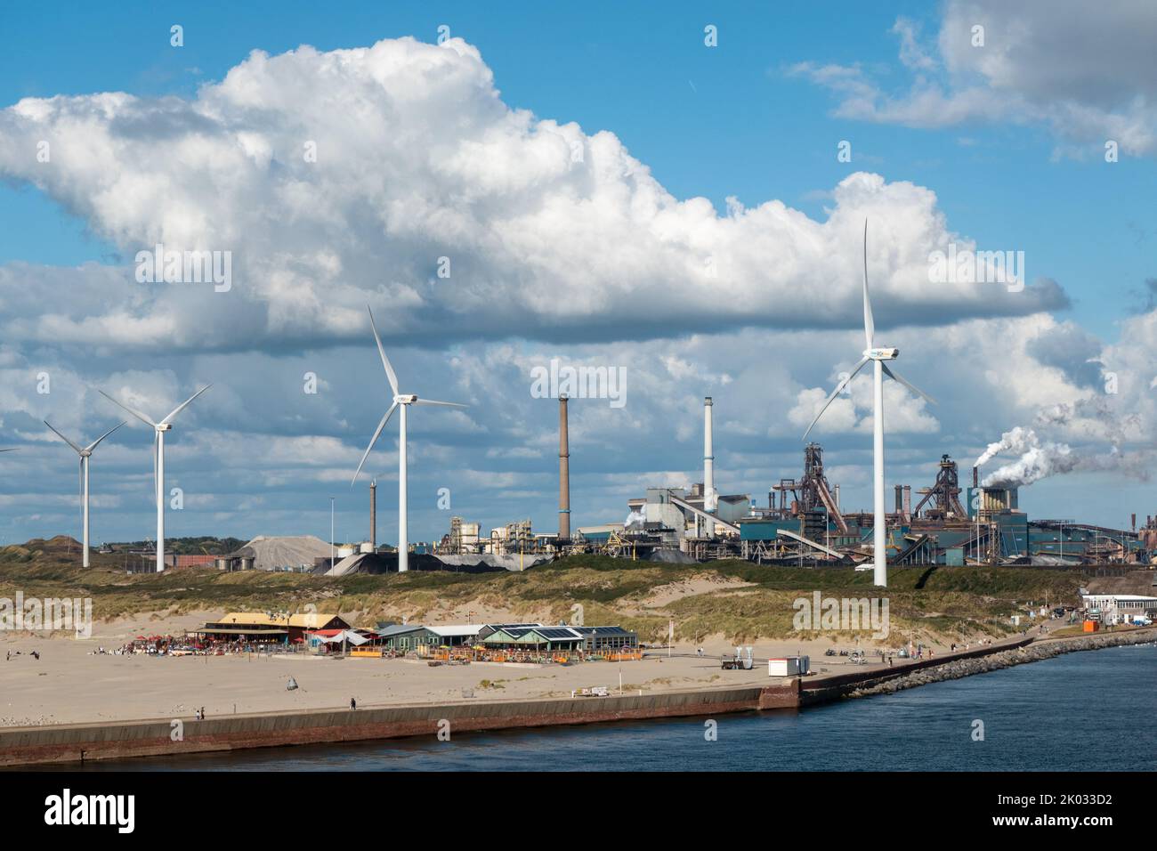 People enjoy the beach of Ijmuiden near the Tata Steel plant on News  Photo - Getty Images