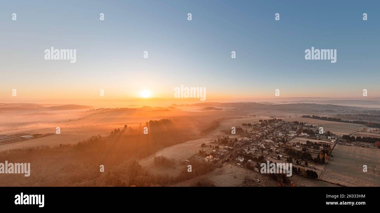 Germany, Thuringia, Großbreitenbach, Willmersdorf, village, fields, forest, mountains, valley, fog fields, sunrise, backlight, aerial photo Stock Photo