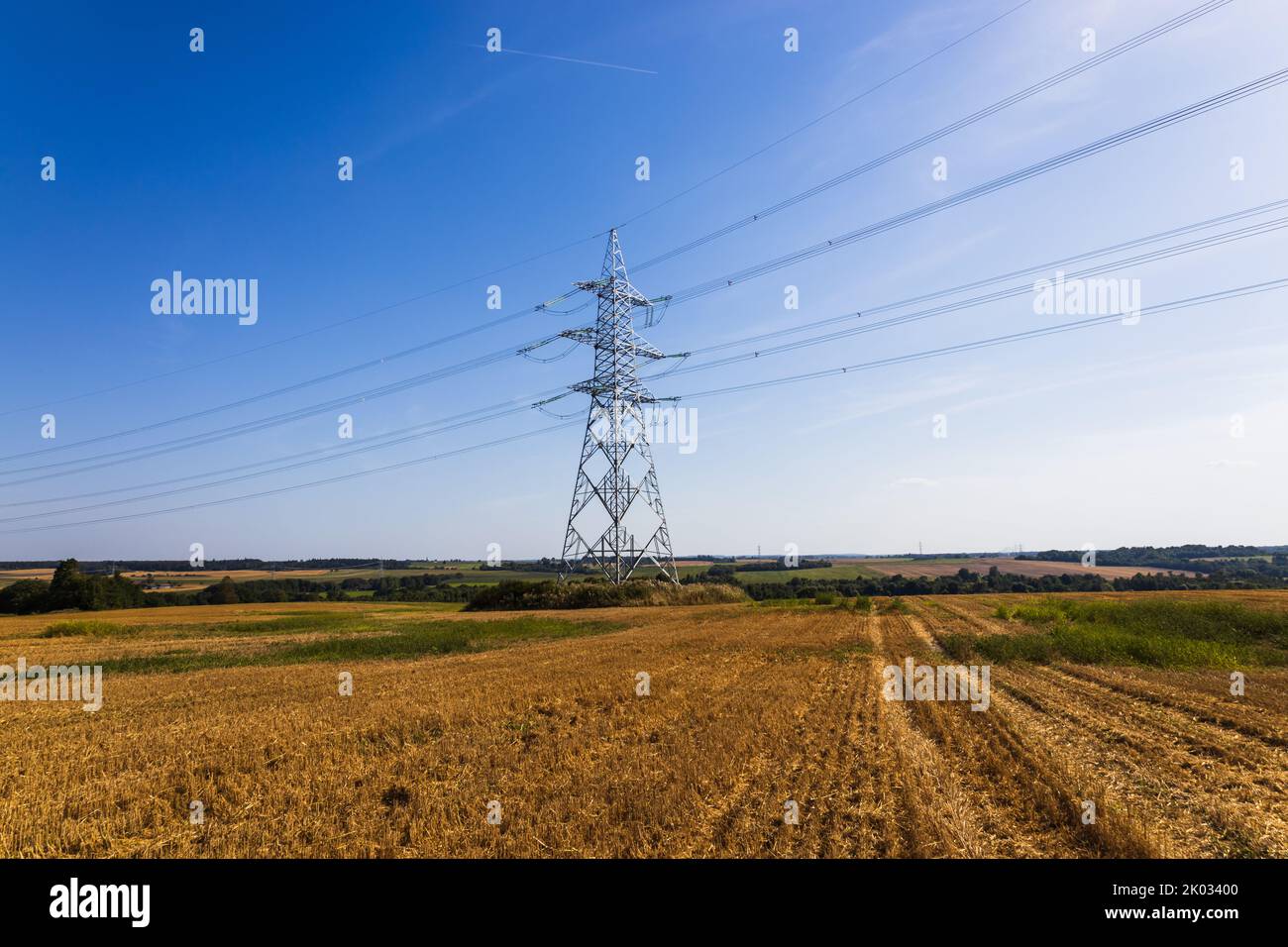 High voltage pole or High voltage electricity tower and transmission power lines Stock Photo
