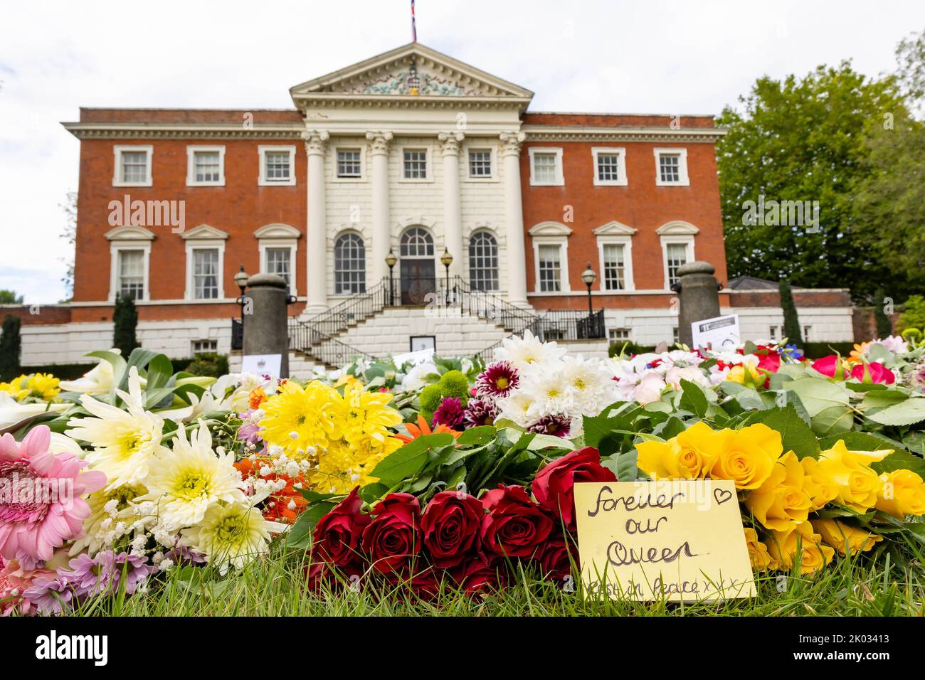 Warrington Town Hall, Cheshire, UK. 09th Sep, 2022. UK - Flowers placed in front of Warrington Town Hall laid by members of the public in respect of the passing of our Queen Elizabeth II Credit: John Hopkins/Alamy Live News Stock Photo