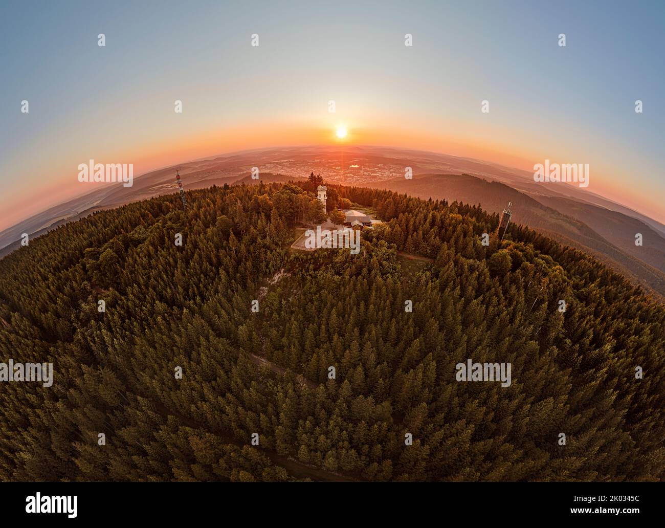 Germany, Thuringia, Ilmenau, Kickelhahn, observation tower, Telekom tower, sunrise, forest, mountains, hemisphere panorama Stock Photo